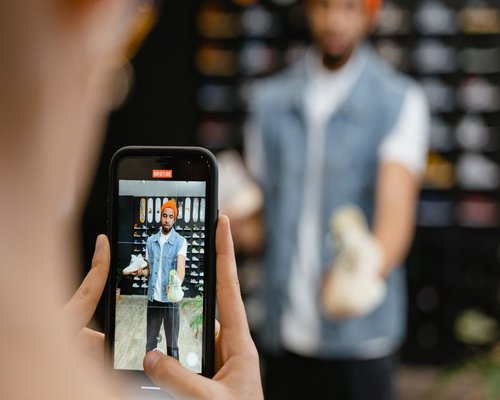 Mobile gaming demonstration shown on a smartphone inside an Australian technology showcase